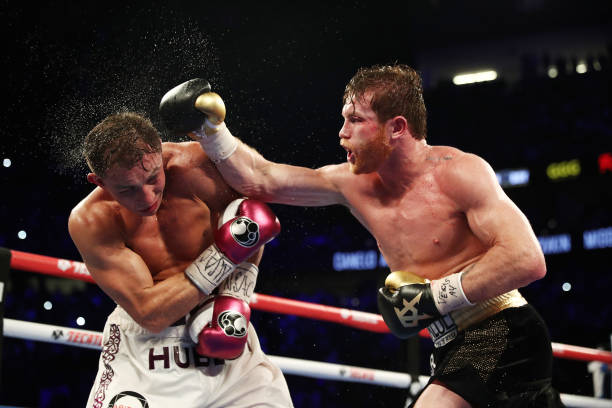 Canelo Alvarez punches Gennady Golovkin during their WBC/WBA middleweight title fight at T-Mobile Arena on September 15, 2018 in Las Vegas, Nevada.