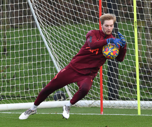 Caoimhin Kelleher of Liverpool during a training session at AXA Training Centre on December 24, 2021 in Kirkby, England.