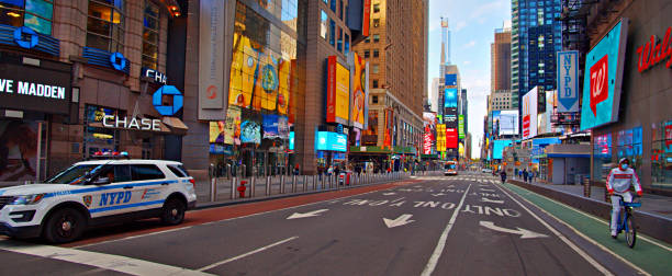 NYPD car and Times Square. Panoramic Creative View.