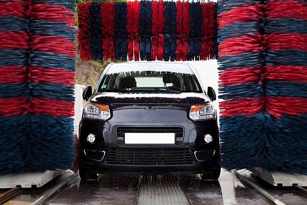 car in a car wash - car washing stock pictures, royalty-free photos & images