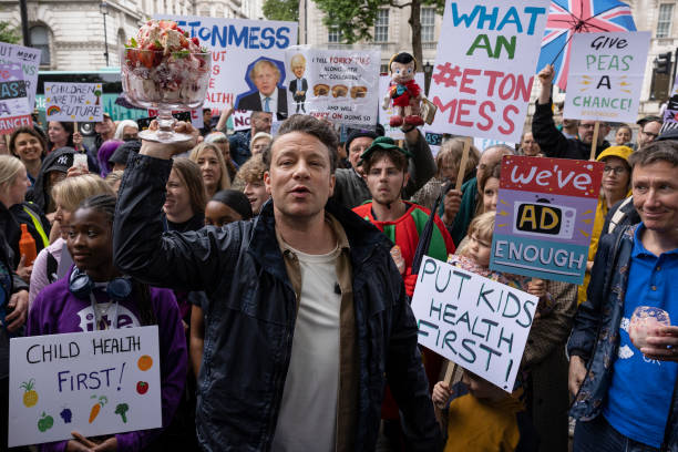 GBR: Jamie Oliver Stages "Eton Mess" Protest Over Government U-Turn On Anti-obesity Strategy