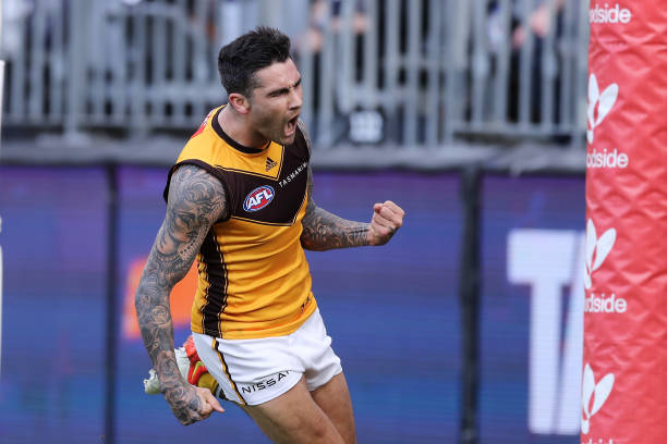 Chad Wingard of the Hawks celebrates after scoring a goal during the 2022 AFL Round 13 match between the Fremantle Dockers and the Hawthorn Hawks at...