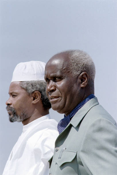 Chadian President Hissene Habre is welcomed by President of Zambia Kenneth Kaunda on September 23 1987 at Lusaka airport Zambia to attend the OAU...