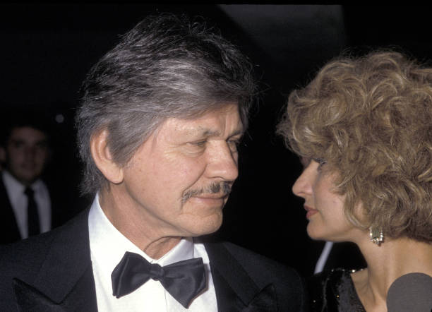 American actor Charles Bronson and his wife, British 