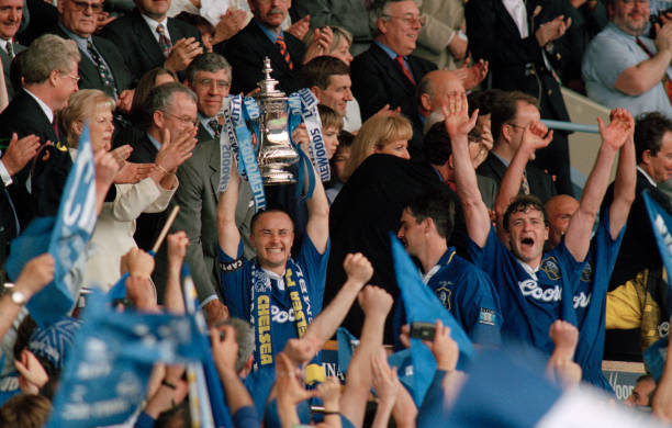 Chelsea captain Dennis Wise lifts the trophy during the presentation in the Royal Box following the FA Cup Final between Chelsea and Middlesbrough at...