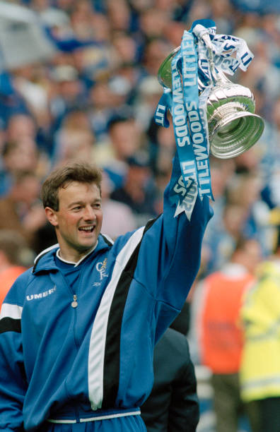 Chelsea goalkeeping coach and former player Eddie Niedzwiecki celebrates with the trophy after the FA Cup Final between Chelsea and Middlesbrough at...