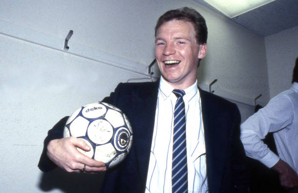 Chelsea player David Speedie who scored a hat-trick, with the match ball celebrates victory in the dressing room after the Full Members Cup Final...