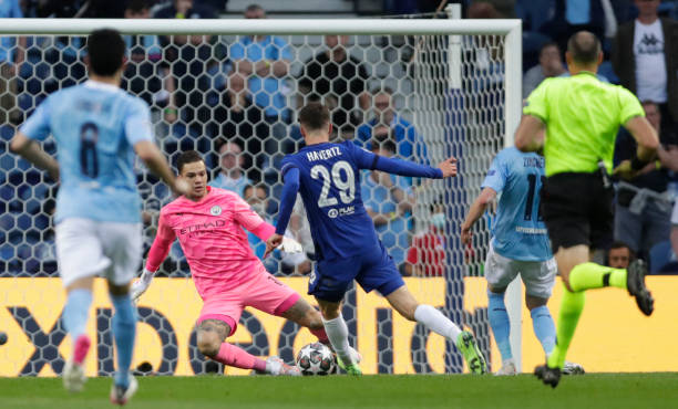 Chelsea's German midfielder Kai Havertz scores his team's first goal during the UEFA Champions League final football match between Manchester City...