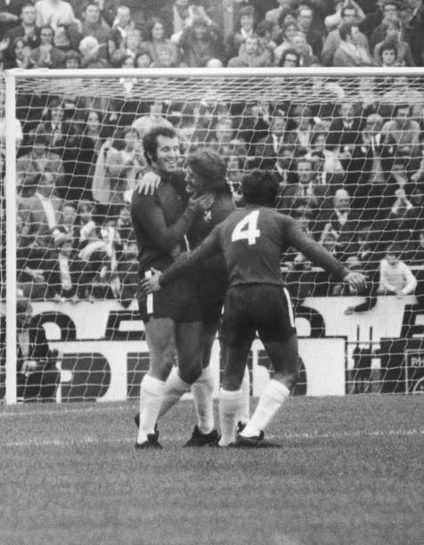 Chelsea's Peter Osgood is congratulated by teammates Charlie Cooke and John Hollins after Osgood laid on a goal scored by Tommy Baldwin during a...