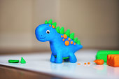 children's creativity. figurine of plasticine. toy animal dinosaur