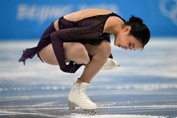 China's Zhu Yi competes in the women's single skating short program of the figure skating team event during the Beijing 2022 Winter Olympic Games at...