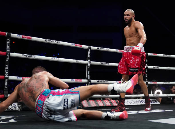 Chris Eubank Jr knocks down Liam Williams in the middleweight contest at the Motorpoint Arena Cardiff. Picture date: Saturday February 5, 2022.