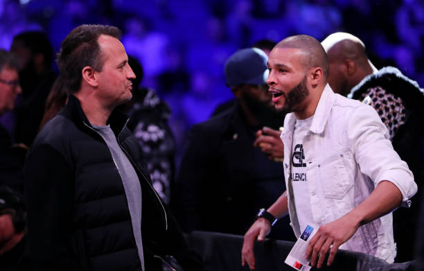 Chris Eubank Jr. Speaks with Boxing Promoter Nisse Sauerland during the Okolie v Cieslak fight night at The O2 Arena on February 27, 2022 in London,...