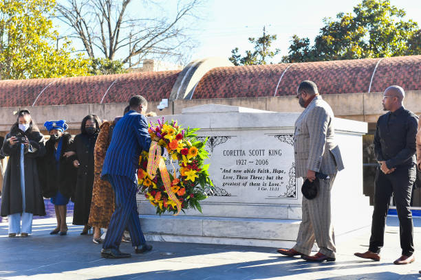 Christine King Farris, Dr. Bernice A. King and the family of Dr. Martin Luther King lay a wreath on his grave during the 2021 King Holiday Observance...