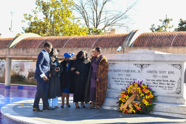 Christine King Farris, Dr. Bernice A. King and the family of Dr. Martin Luther King lay a wreath on his grave during the 2021 King Holiday Observance...
