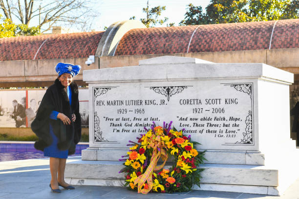Christine King Farris is seen laying a wreath on the grave of Dr. Martin Luther King during the 2021 King Holiday Observance Beloved Community...