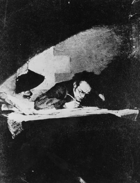 Austrian composer Franz Schubert at work on a composition.