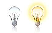 Classic light bulb isolate on white background. Turn on and turn off of Tungsten light bulb show big idea,  innovation, save energy, idea of Evolution, old style or retro light bulb Concept.