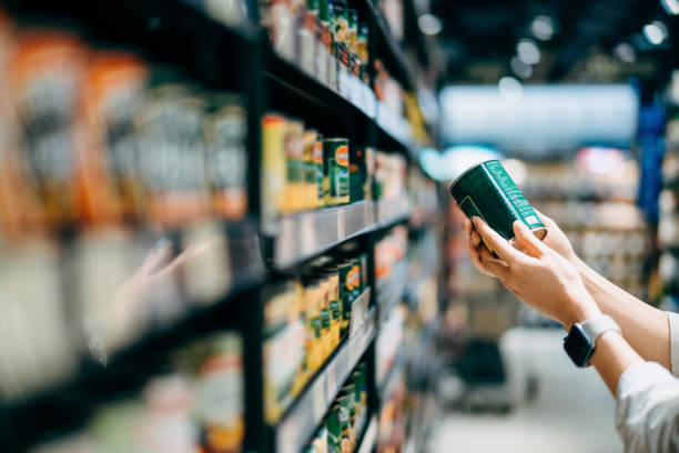 close up of a woman grocery shopping in supermarket holding a tin can picture id1330339657?k=20&m=1330339657&s=612x612&w=0&h=ce5Isx0RWpeXnyWwu CUjmV8ecnDotGfFT3AwV7q9ZE=