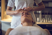 Close up young women enjoying head massage