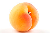 Close-up of a yellow-red apricot isolated on white
