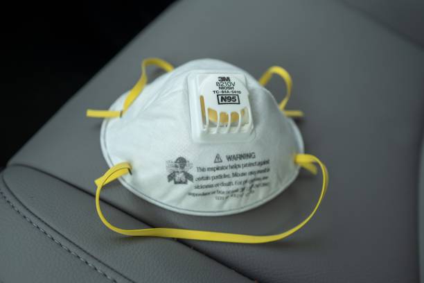 closeup-of-n95-respirator-mask-during-an-outbreak-of-covid19-san-picture-id1215961232