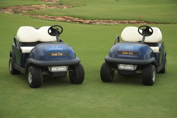 Club Car buggies are pictured on the 18th hole during Day three of the DP World Tour Championship at Jumeirah Golf Estates on December 12, 2020 in...