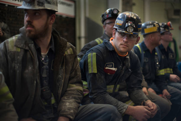 Coal miner Jaden Fredrickson of Cheat Lake, West Virginia, waits for the arrival of U.S. Environmental Protection Agency Administrator Scott Pruitt...