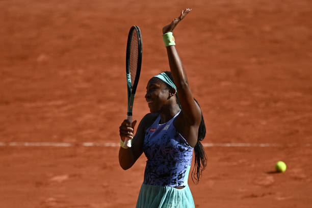 Coco Gauff reacts after winning against Italy's Martina Trevisan at the end of their women's semi-final singles match on day twelve of the...