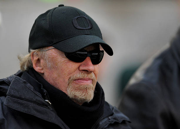 Co-founder and Chairman of Nike, Phil Knight, looks on as the Oregon Ducks warm up before the game against the Arizona Wildcats at Autzen Stadium on...