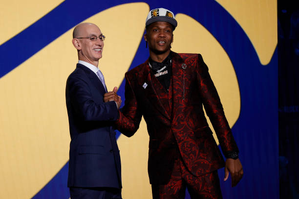 Commissioner Adam Silver and Bennedict Mathurin pose for photos after Mathurin was drafted with the 6th overall pick by the Indiana Pacers during the...