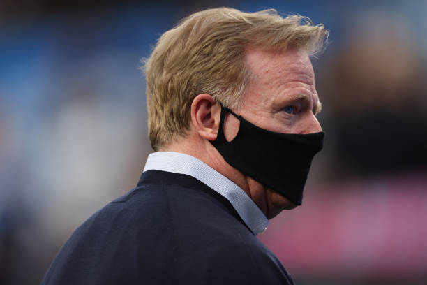 Commissioner Roger Goodell wears a protective face covering due to the Covid-19 pandemic before the Las Vegas Raiders play against the Los Angeles...