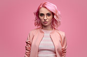 Confident female with pink hair