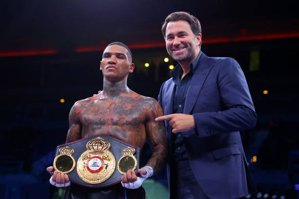 Conor Benn poses with their belt alongside Eddie Hearn, Boxing Promoter and Chairman of Matchroom after victory in the WBA Continental Welterweight...