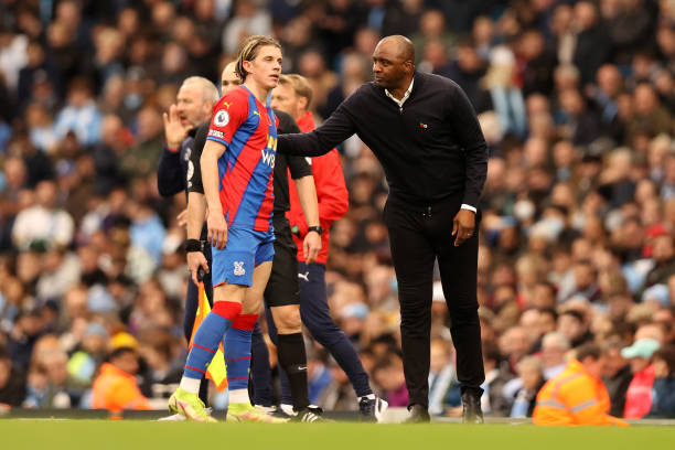 Conor Gallagher of Crystal Palace speaks with Patrick Vieira, Manager of Crystal Palace during the Premier League match between Manchester City and...
