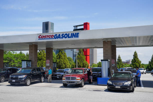consumers pump gas at a costco gasoline station on may 11 in atlanta picture