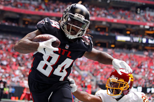 Cordarrelle Patterson of the Atlanta Falcons scores a touchdown reception against Kendall Fuller of the Washington Football Team in the third quarter...