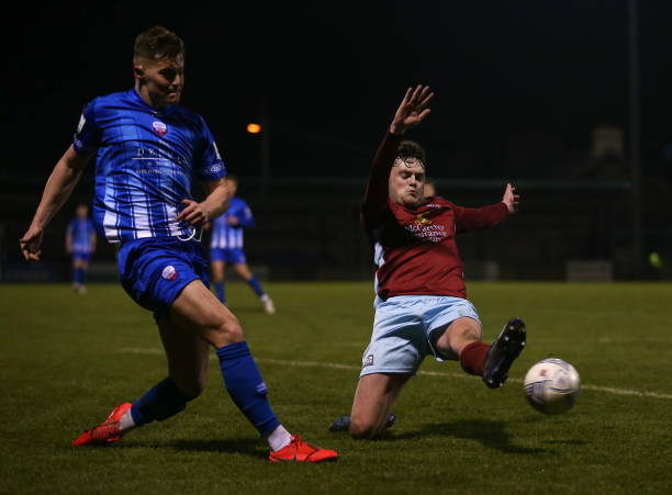 Cork , Ireland - 4 March 2022; Charlie Fleming of Treaty United in action against Jack Larkin of Cobh Ramblers during the SSE Airtricity League First...