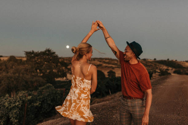 couple dancing outdoors at dusk,paso robles,ca,united states,usa - love stock pictures, royalty-free photos & images