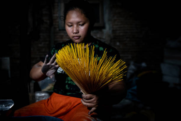 IDN: Craftsmen Make Incense Sticks For Chinese New Year