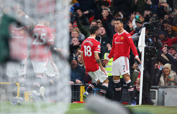 Cristiano Ronaldo of Manchester United celebrates after scoring their side's second goal during the Premier League match between Manchester United...