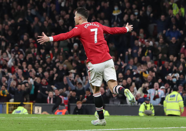 Cristiano Ronaldo of Manchester United celebrates scoring their first goal during the Premier League match between Manchester United and Chelsea at...