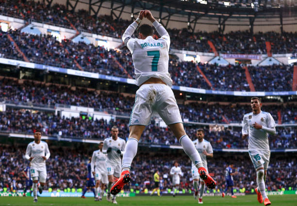 https://media.gettyimages.com/photos/cristiano-ronaldo-of-real-madrid-cf-celebrates-scoring-their-opening-picture-id923755548?b=1&k=6&m=923755548&s=612x612&w=0&h=L9v80dYERQqKxDi1fIqAbCcVbs_yi8X_4PUCnCO01AY=