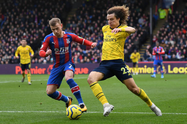 Crystal Palace's German midfielder Max Meyer vies with Arsenal's Brazilian defender David Luiz during the English Premier League football match...