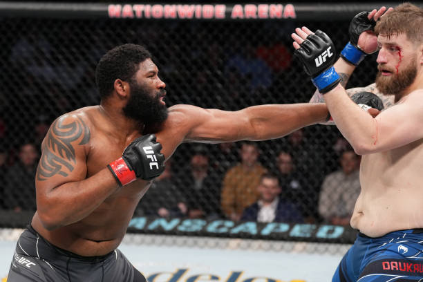 Curtis Blaydes punches Chris Daukaus in a heavyweight fight during the UFC Fight Night event at Nationwide Arena on March 26, 2022 in Columbus, Ohio.