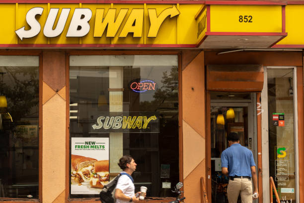 customer enters a subway restaurant location in new york us on friday picture id1233831638?k=20&m=1233831638&s=612x612&w=0&h=vG4UQNmXZuQGAj6vbPPbxRapRn4FLy53efXriqrml w=