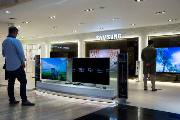 customers look at a samsung electronics co curved suhd televisions at picture id663969046?k=20&m=663969046&s=612x612&w=0&h=o62MN1Rf 871v 5rX7I9Zboi aF1C585zzcSVmZLaXo=