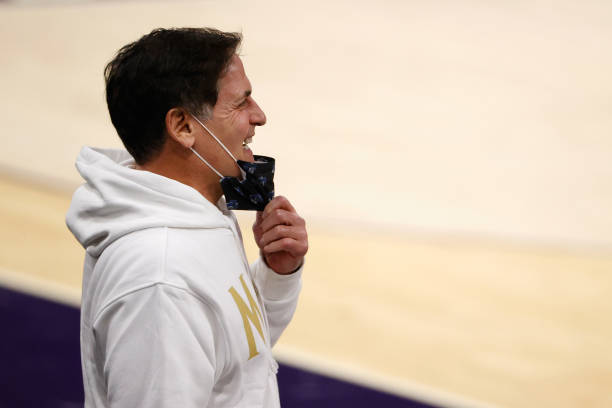 Dallas Mavericks owner, Mark Cuban reacts to players during warm-ups to the NBA game against the Phoenix Suns at PHX Arena on December 23, 2020 in...