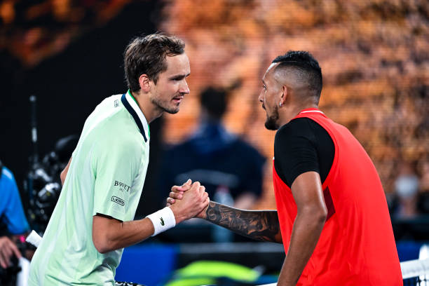 Daniil Medvedev of Russia shakes hands with Nick Kyrgios of Australia after beating him during day four of the 2022 Australian Open at Melbourne Park...