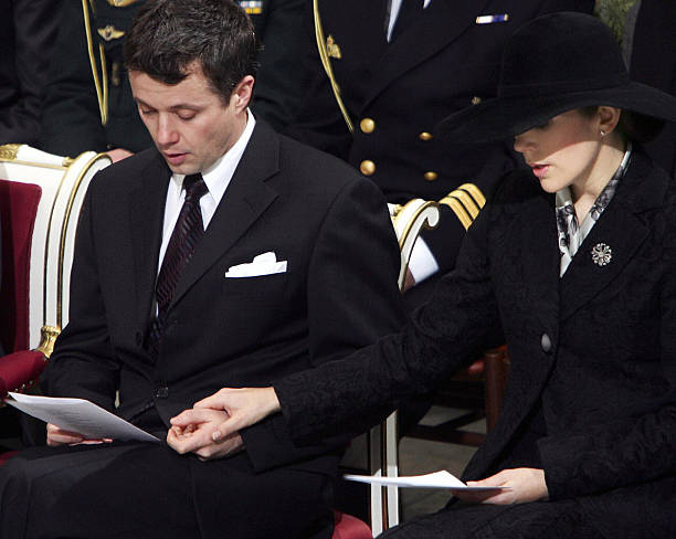danish-crown-prince-frederik-holds-the-hand-of-his-wife-crown-mary-picture-id51908714
